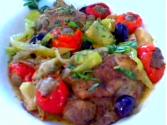Mediterranean-style Braised Chicken Topped With Sausage Stuffed Cherry Peppers 